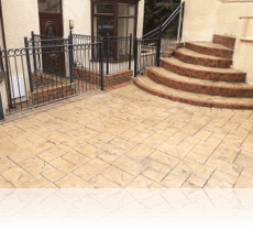 Ashlar Slate path and steps in Biscuit with Mahogany